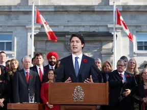 Justin Trudeau speaks in front of his cabinet after being sworn in as prime minister on Nov. 4, 2015.