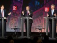 Justin Trudeau, Thomas Mulcair and Stephen Harper speak during the second leaders' debate in Calgary, Alberta, Canada, on Thursday, Sept. 17, 2015.