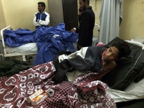 Abdallah Abdel Nasser, 14, receives medical treatment at Suez Canal University hospital in Ismailia, Egypt, Friday, Nov. 24, 2017, after he was in injured during an attack on a mosque. Militants attacked a crowded mosque during Friday prayers in the Sinai Peninsula, setting off explosives, spraying worshippers with gunfire and killing more than 200 people in the deadliest ever attack by Islamic extremists in Egypt. (AP Photo/Amr Nabil)