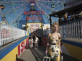This image released by Amazon Studios shows Juno Temple in a scene from "Wonder Wheel." (Jessica Miglio/Amazon Studios via AP)