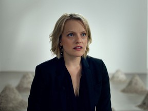 This image released by Magnolia Pictures shows Elisabeth Moss in a scene from "The Square." (Magnolia Pictures via AP)