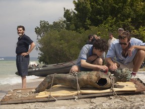 This image released by Sony Pictures Classics shows, from left, Michael Stuhlbarg, Timothée Chalamet and Armie Hammer in a scene from "Call Me By Your Name." (Sony Pictures Classics via AP)