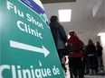 An Ottawa Public Health flu shot clinic at an area high school in January 2013.  Darren Brown/Postmedia