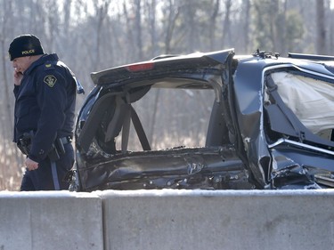 OPP investigate an accident on Highway 401 just east of Prescott Ontario Tuesday Nov 28, 2017. A Quebec trucker was arrested early Tuesday morning hours after two people were killed in a five-vehicle crash late Monday on Highway 401. Four people were also taken to hospital after the crash at about 10:30 p.m. Monday between Prescott and Highway 416, one of them by air ambulance with life-threatening injuries.