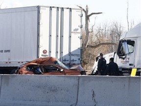 OPP investigate an accident on Highway 401 just east of Prescott onTuesday Nov 28. A Quebec trucker was arrested hours after two people were killed in the five-vehicle crash.