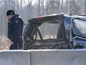 OPP investigate an accident on Highway 401 just east of Prescott Ontario Tuesday Nov 28, 2017. A Quebec trucker was arrested early Tuesday morning hours after two people were killed in a five-vehicle crash late Monday on Highway 401.
