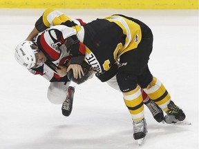 The Ottawa 67's took on the Kingston Frontenacs during the kids school day game at the Canadian Tire Centre in Ottawa Wednesday Nov 1, 2017. 67's Travis Barron and Kingston's Jacob Paquette fight during first period action Wednesday.