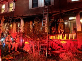 Ottawa firehouses work on a blaze at a Sandy Hill rowhouse early Friday.