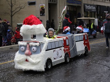 The annual Help Santa Toy Parade made its way through downtown Ottawa, featuring familiar festive floats, marching bands, city councillors, firefighters and more, with volunteers collecting toys for less fortunate children along the way, on Saturday, Nov. 18, 2017