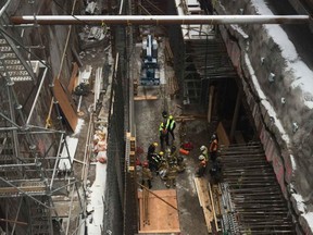 Ottawa Fire's High Angle team deployed to remove an injured worker from a below grade site on Queen Street.