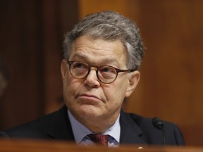 In this Sept. 20, 2017 file photo, Sen. Al Franken, D-Minn., listens during a Senate Judiciary Committee hearing for Colorado Supreme Court Justice Allison Eid. Franken is accused of touching a woman inappropriately while having their photograph taken in 2010. He has also been accused of forcibly kissing a woman in 2006.