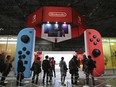Journalists wait outside the venue for the presentation of the Nintendo Switch in Tokyo.