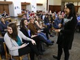 Peterborough-Kawartha MP Maryam Monsef, Minister for the Status of Women, chats with female students about entering the 'STEM' fields of study: science, tech, engineering and maths.