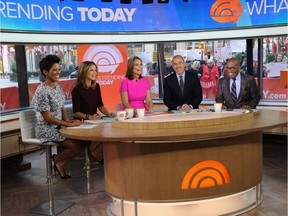 In this Monday, Nov. 3, 2014 photo provided by NBC, from left, Tamron Hall, Natalie Morales, Savannah Guthrie, Matt Lauer, and Al Roker appear on the "Today" show, in New York. (AP Photo/NBC, Bryan Bedder)