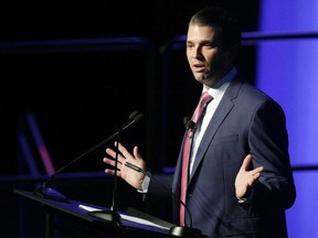 FILE - In this Oct. 5, 2017, file photo, Donald Trump Jr. speaks during a fundraiser for Faulkner University in Montgomery, Ala. President Donald Trump's son communicated with the Twitter account behind WikiLeaks, exchanging direct messages during the 2016 election about leaked emails from Democrat Hillary Clinton's campaign and other issues of interest to the group, according to a report from The Atlantic. The report details several direct messages between WikiLeaks and Donald Trump Jr., including requests to push out Tweets highlighting the website's work. (AP Photo/Brynn Anderson, File)