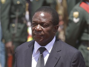 In this Sunday, Dec, 7, 2014, file photo, Emmerson Mnangagwa attends at the National Shrine in Harare. Mnangagwa is widely expected to take over as Zimbabwe's leader within 48 hours, following the resignation of Mugabe, Tuesday Nov. 21, 2017. ( AP Photo/Tsvangirayi Mukwazhi, FILE) ORG XMIT: XTM104

SUNDAY, DEC, 7, 2014, FILE PHOTO
Tsvangirayi Mukwazhi, AP