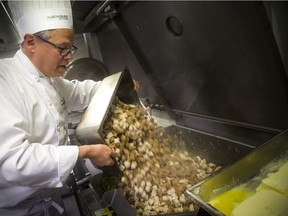 Volunteers, students and chefs were busy preparing a festive meal in support of Operation Big Turkey at the Algonquin College School of Hospitality Kitchen Saturday December 23, 2017. The thirteenth year of Operation Big Turkey has over 200 volunteers coming together to make 2500 turkey dinners to anyone who would like to have a meal.  Chef Steve Price, a professor with the Algonquin culinary management program, has been taking part with this for over ten years. Price was busy mixing up the stuffing.   Ashley Fraser/Postmedia