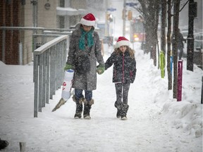 The heavy snow did not stop shoppers from getting out and finishing off their to-do lists in Westboro Saturday December 23, 2017.