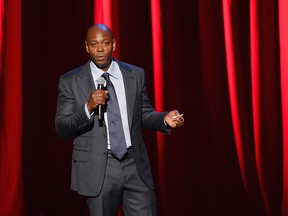 Comedian/actor Dave Chappelle performs at Radio City Music Hall on June 19, 2014 in New York City.