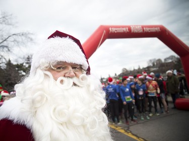 The 27th Annual Santa Shuffle Fun Run and Elf Walk took place along the Canal near Lansdowne Saturday December 2, 2017.  Santa was on hand to cheer on the runners and hand out medals after the runners finished.   Runners and walkers came out to take part in the event raising money for the Salvation Army.