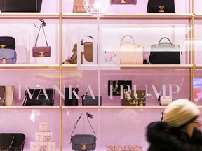 A pedestrian passes in front of an Ivanka Trump brand store at Trump Tower in New York, U.S., on Thursday, Dec. 14, 2017.