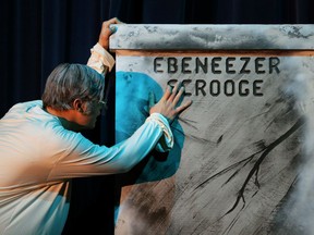 Ebenezer Scrooge played by Robert Kemp, during St. Mother Teresa Catholic High School's production of A Christmas Carol, held Dec. 16, 2017, at St. Mother Teresa High School.