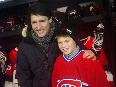 Prime Minister Justin Trudeau poses with his son, Xavier, before the Ottawa Senators and the Montreal Canadiens played.