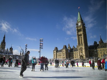 People braved the chilly temperatures to enjoy a skate in the sunshine on Parliament Hill, part of the Canada 150 events on Parliament Hill Saturday December 16, 2017.