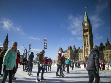 People braved the chilly temperatures to enjoy a skate in the sunshine on Parliament Hill, part of the Canada 150 events on Parliament Hill Saturday December 16, 2017.