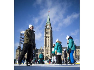 People braved the chilly temperatures to enjoy a skate in the sunshine on Parliament Hill, part of the Canada 150 events on Parliament Hill Saturday December 16, 2017.