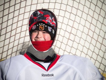 The official tailgate party of the 2017 Scotiabank NHL100 Classic took place at Lansdowne on Saturday, Dec. 16, 2017. Nine-year-old Sam Murphy from Nova Scotia poses for a photo in the hockey player cutouts.