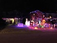 Kailee Wise, who lives in the Taffy Lane house on the right, this year brightened up her neighbour's lawn with this 'DITTO' sign.