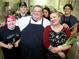 Chef Bruce Wood (centre) and at-risk youth make tourtières to sell as part of FoodWorks, a social enterprise that engages at-risk youth in Ottawa in the development of culinary skills. They include (from left): youths Ellie Watts, 22, Sean Hartman, 18, Christine Carroll, 25, Foodworks business consultant, Mandi Lunan, and Brad Tessier.