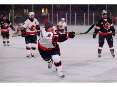Alfie unloads in front of the net as his team climbed 2-0 in the first period. In front of Parliament Hill, the NHL 100 Classic, featuring Ottawa Senators alumni players from 25 years, thrilled the fans in Ottawa Friday (Dec. 15, 2017) night. Julie Oliver/Postmedia