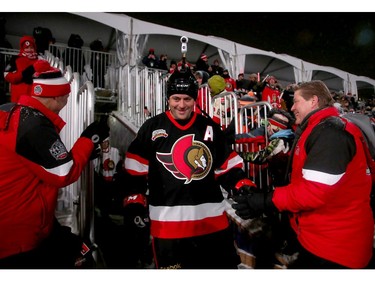 Chris Phillips horses around with Randy Lee (right) as he comes out of the locker room. In front of Parliament Hill, the NHL 100 Classic, featuring Ottawa Senators alumni players from 25 years, thrilled the fans in Ottawa Friday (Dec. 15, 2017) night. Julie Oliver/Postmedia