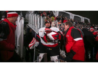 Goalie Patrick Lalime seemed in fine form, joking around before the game with Randy Lee (right). In front of Parliament Hill, the NHL 100 Classic, featuring Ottawa Senators alumni players from 25 years, thrilled the fans in Ottawa Friday (Dec. 15, 2017) night. Julie Oliver/Postmedia