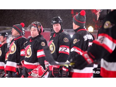 Shaun Van Allen (centre) listens to some chatter on Phillip's line before the game. In front of Parliament Hill, the NHL 100 Classic, featuring Ottawa Senators alumni players from 25 years, thrilled the fans in Ottawa Friday (Dec. 15, 2017) night. Julie Oliver/Postmedia