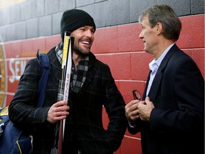 Mike Fisher chats with Laurie Boschman in the hall at the Canadian Tire Centre on Thursday, Dec. 14, 2017.  Ottawa Senators alumni took to the ice for a warmup for their big game Friday night on Parliament Hill.