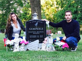Alisha Tackaberry and Marc Gemperle are seen at the Oakland Cemetery gravesite of their son Graysen.