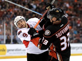 Former Duck Bobby Ryan (9) collides with Jakob Silfverberg in a game last December in Anaheim.