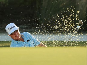 Charley Hoffman plays a shot from a bunker on the 15th hole during the third round of the Hero World Challenge at Nassau, Bahamas, on Saturday.