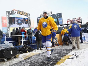 Kyle Okposo of the Sabres leaves the ice following practice at Citi Field in New York on Sunday.