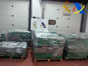 This handout undated picture released on December 5, 2017 by Spanish Interior Ministry shows the 331 kg of heroin seized by Spanish Guardia Civil at the Algeciras seaport. Spanish police have seized 331 kilos (730 pounds) of heroin worth an estimated 120 million euros ($142.5 million), in one of the country's biggest-ever drug hauls, officials said on December 5, 2017.