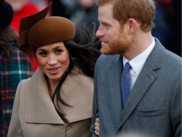 (L-R) US actress and finacee of Britain's Prince Harry Meghan Markle and Britain's Prince Harry arrive to attend the Royal Family's traditional Christmas Day church service at St Mary Magdalene Church in Sandringham, Norfolk, eastern England, on December 25, 2017.