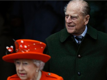 Britain's Prince Philip, Duke of Edinburgh (R) leaves after attending the Royal Family's traditional Christmas Day church service at St Mary Magdalene Church in Sandringham, Norfolk, eastern England, on December 25, 2017.