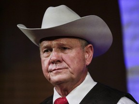 Former Alabama Chief Justice and U.S. Senate candidate Roy Moore speaks at a rally, in Fairhope, Ala.