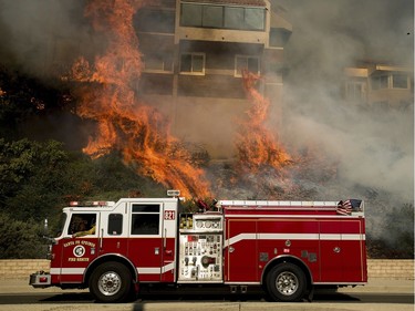 Flames consume a Foothill Rd. residence as the Thomas fire rages in Ventura, Calif., on Tuesday, Dec. 5, 2017.