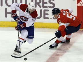 Canadiens' Alex Galchenyuk moves the puck against Florida Panthers' MacKenzie Weegar on Saturday, Dec. 30, 2017, in Sunrise, Fla.