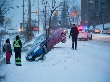 Cars were slip-sliding in the early going, but there were few serious crashes, police said.