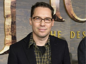 FILE - This Dec. 2, 2013 file photo shows Bryan Singer at the Los Angeles premiere of "The Hobbit: The Desolation of Smaug" at the Dolby Theatre. Singer has left the Queen biopic "Bohemian Rhapsody" in the middle of production. A representative for Twentieth Century Fox Film Corp. said Monday, Dec. 4, 2017, that Singer is no longer the director of the film.